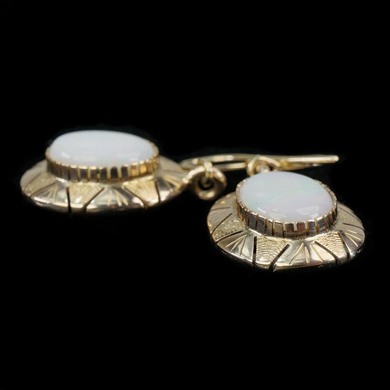 vintage opal earrings in 14k yellow gold with south american sun design