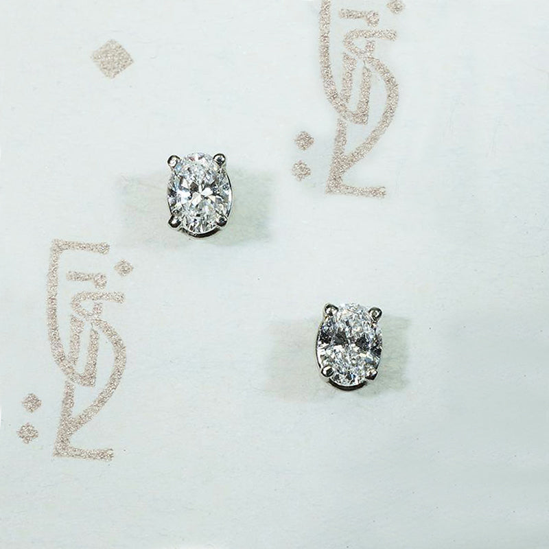 Sparkling Little Oval Cut Diamond Stud Earrings