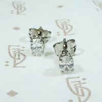 Bright Oval Cut Diamond Studs in White Gold