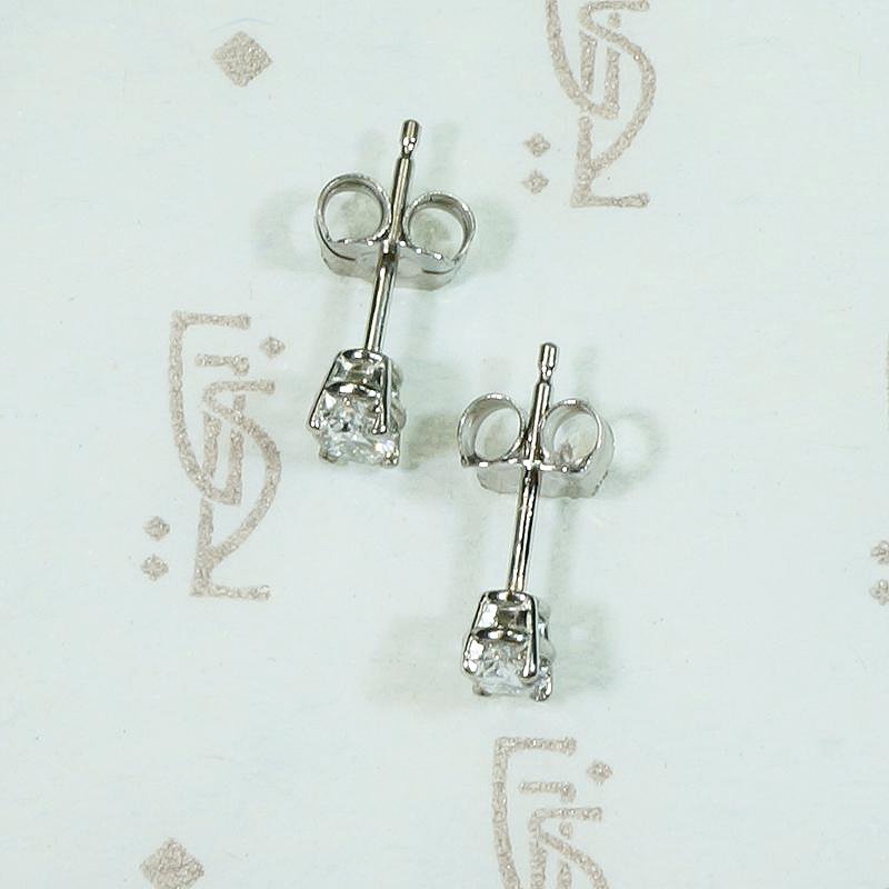 Bright Oval Cut Diamond Studs in White Gold