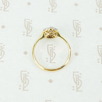 platinum on 18k yellow gold oval sapphire and diamond halo ring top view