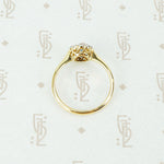 platinum on 18k yellow gold oval sapphire and diamond halo ring top view