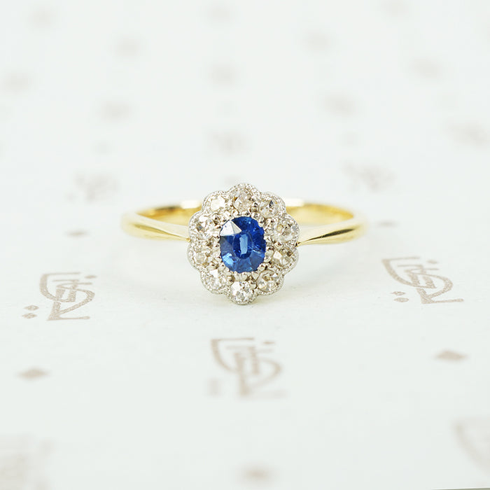platinum on 18k yellow gold oval sapphire and diamond halo ring