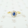 platinum on 18k yellow gold oval sapphire and diamond halo ring