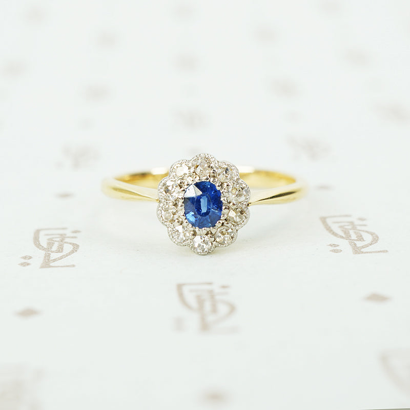 platinum on 18k yellow gold oval sapphire and diamond halo ring