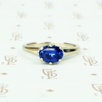 recycled white gold solitaire with oval 1.06 carat blue sapphire 