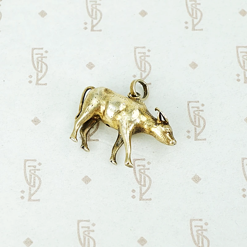 silver gilt oxen pendant