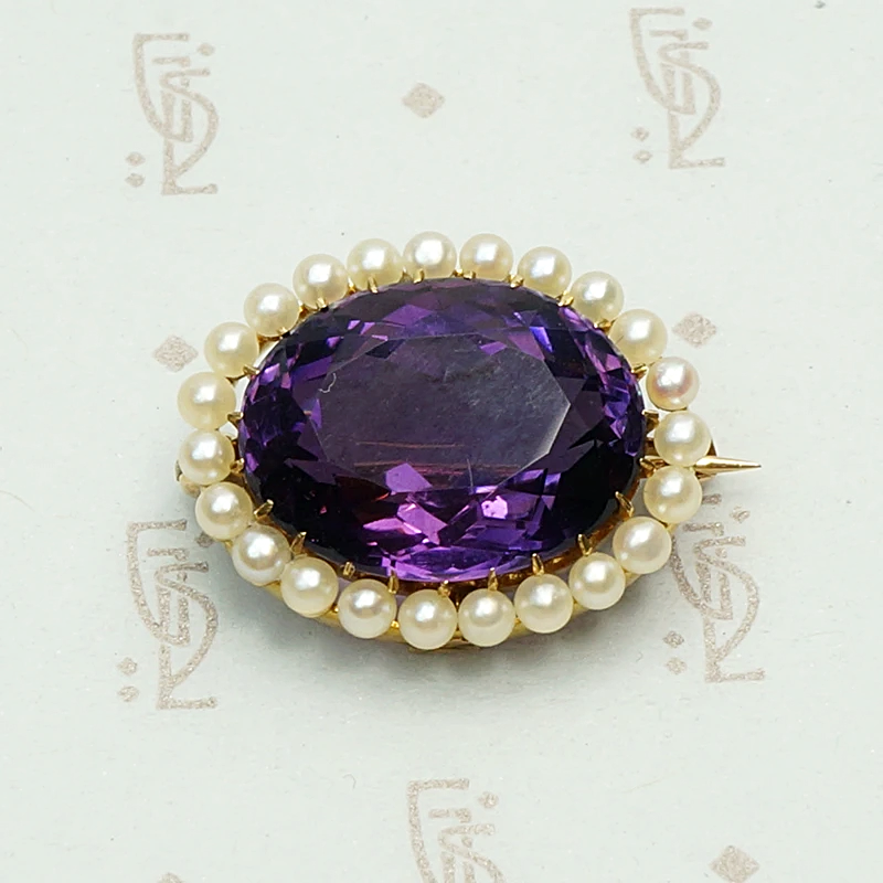Rich Purple Amethyst Brooch with Pearl Halo. Detail view.