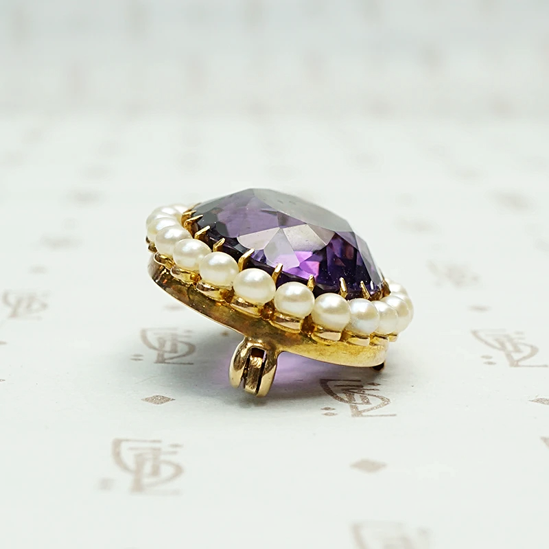 Rich Purple Amethyst Brooch with Pearl Halo. Side view.