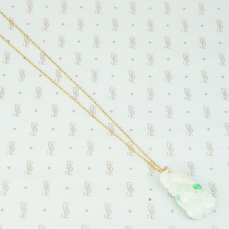 Pale green with apple green streaks carved jade pendant in the shape of plums and peaches on a gold filled chain