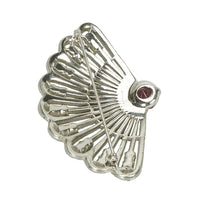 back view of reja brooch signed