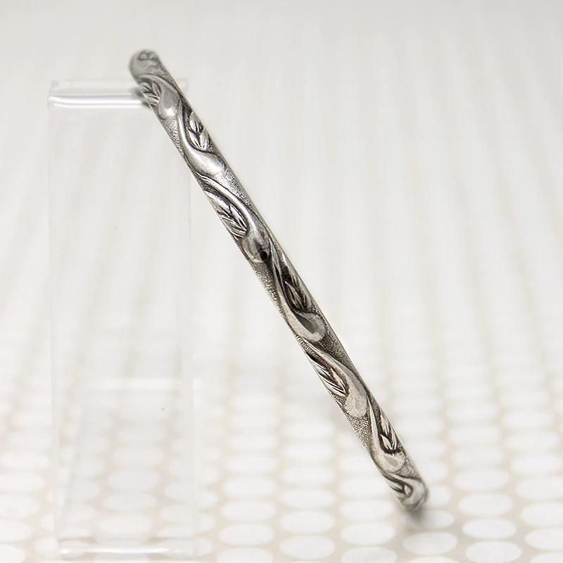 The Patterned Silver Bangle from Allie B.