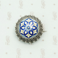 Enameled Brooch in Ornate Silver Frame