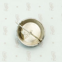 Enameled Brooch in Ornate Silver Frame