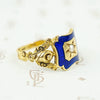 right facing shoulder view of early gold ring featuring roses
