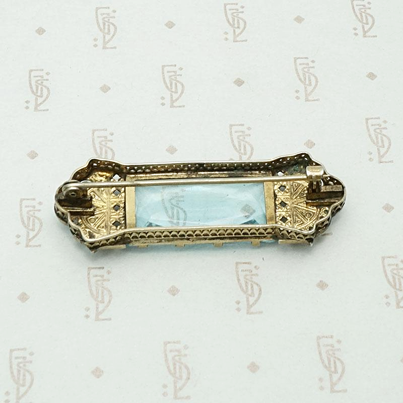 Art Deco brooch in silver plate with blue glass