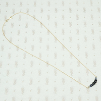 The Olio Arc Necklace in Sapphire and Yellow Gold by brunet