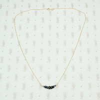 The Olio Arc Necklace in Sapphire and Yellow Gold by brunet