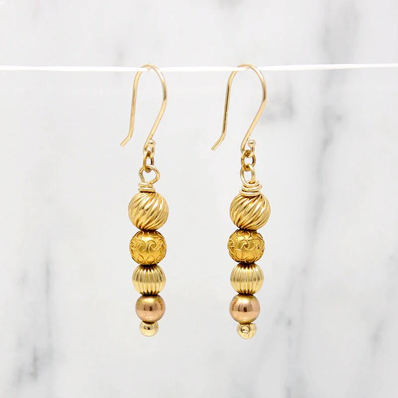 Glowing Gold Bead Bubble Earrings by brunet
