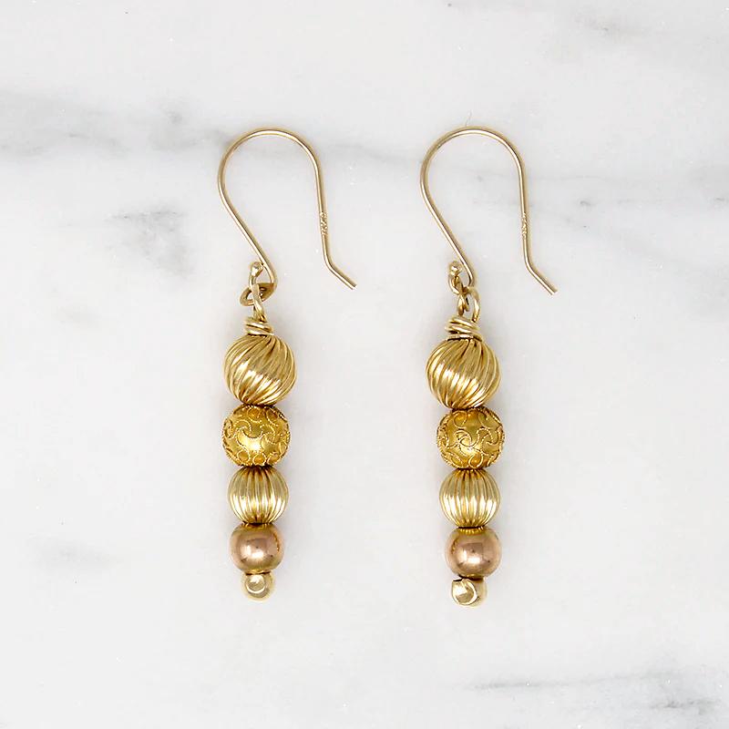 Glowing Gold Bead Bubble Earrings by brunet