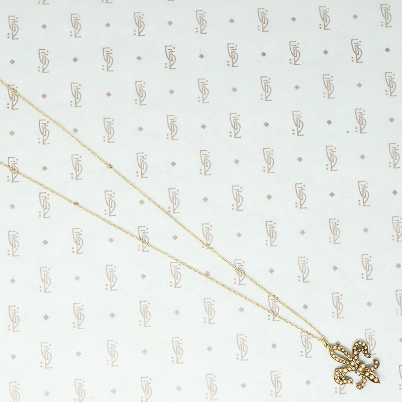 gold fleur de lis pendant set with pearls