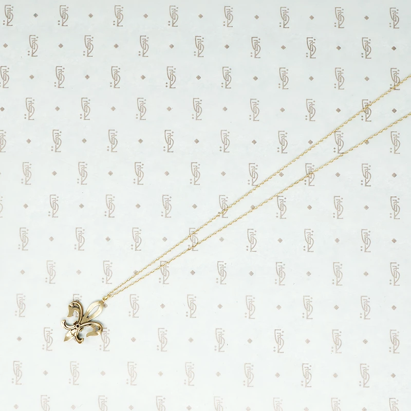 gold fleur de lis pendant set with pearls back view