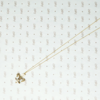 gold fleur de lis pendant set with pearls back view