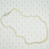 Lovelu long graduated strand of matinee length cultured graduated pearls with an elaborate diamond and platinum clasp