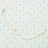 20" long graduated pearls with a Platinum and old mine cut diamond clasp