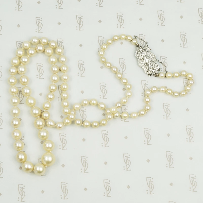 Matinee Length Pearls with Platinum and Diamond Clasp