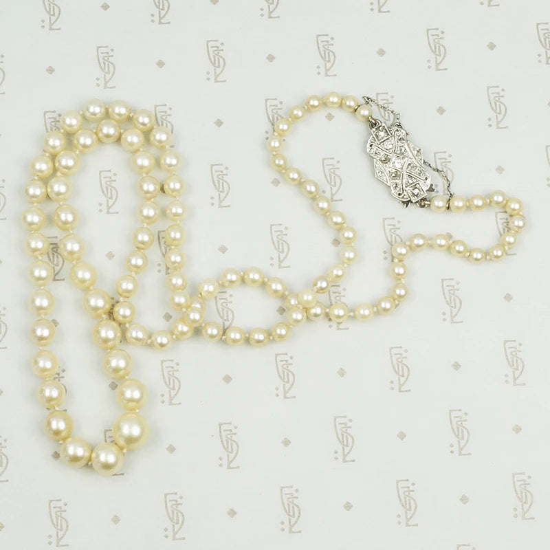 Matinee Length Pearls with Platinum and Diamond Clasp