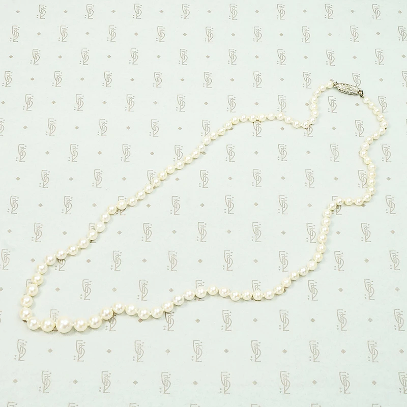 Delightful Diamond Barrel Clasp on Lovely Pearls