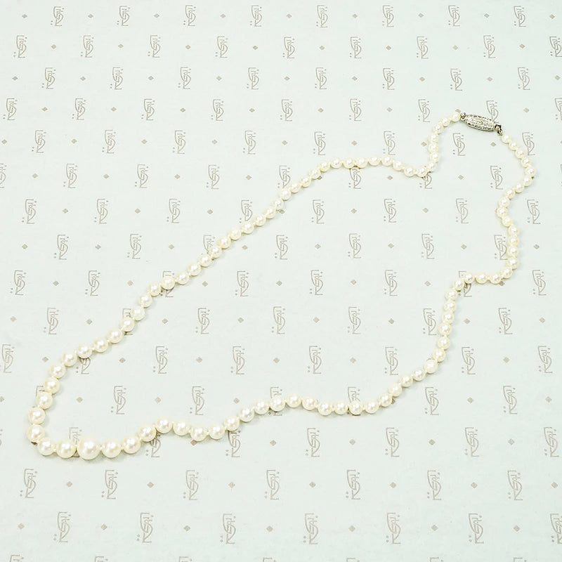 Delightful Diamond Barrel Clasp on Lovely Pearls