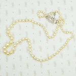 Matinee Length Pearls with Platinum and Diamond Clasp