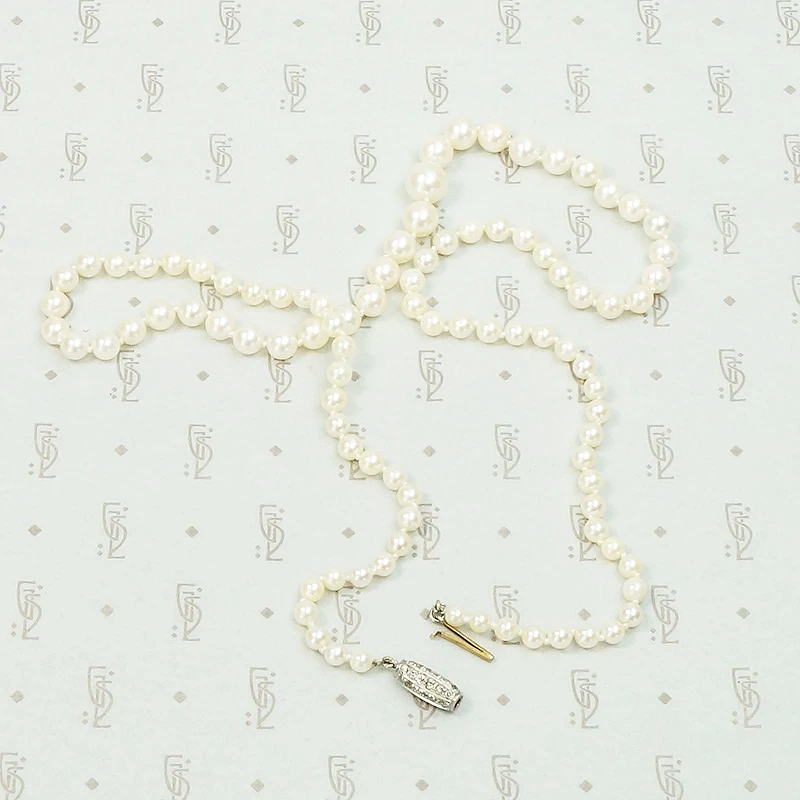 Delightful Diamond Barrel Clasp on Lovely Pearls