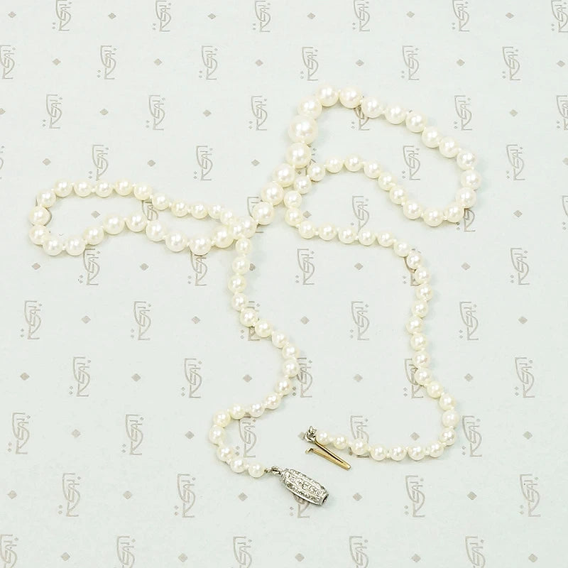 Delightful Diamond Barrel Clasp on Lovely Pearls