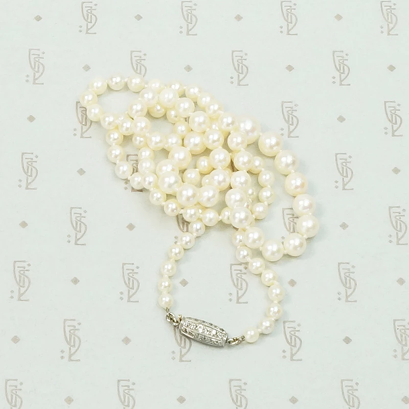 Delightful Diamond Barrel Clasp on Lovely Pearls