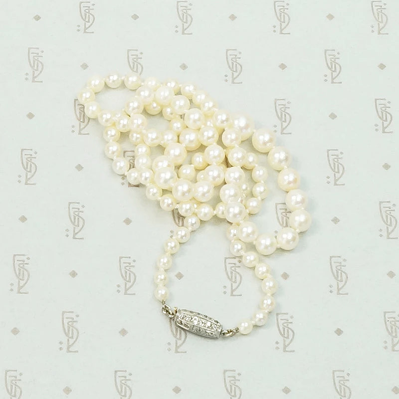 Delightful Diamond Barrel Clasp on Lovely Pearls