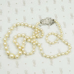 Matinee Length Pearls with Platinum and Diamond Clasp
