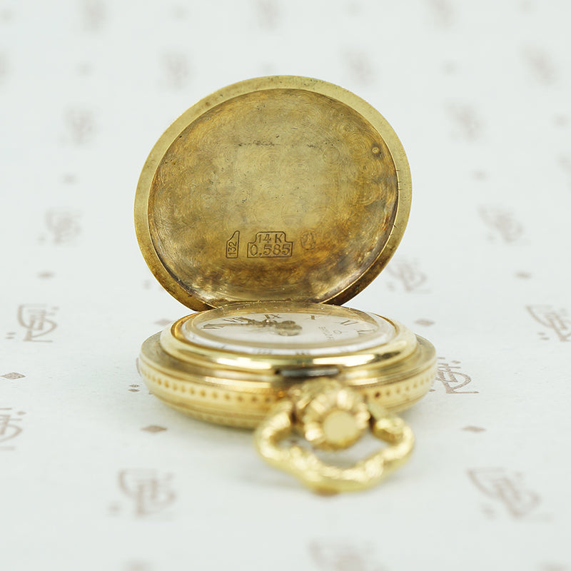 14k gold vintage ladies pendant watch with cover open showing gold marks