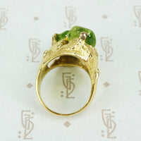 chunky mid mod peridot and gold freeform ring side view