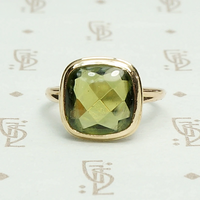 Otsby and Barton Buff Top Peridot Ring