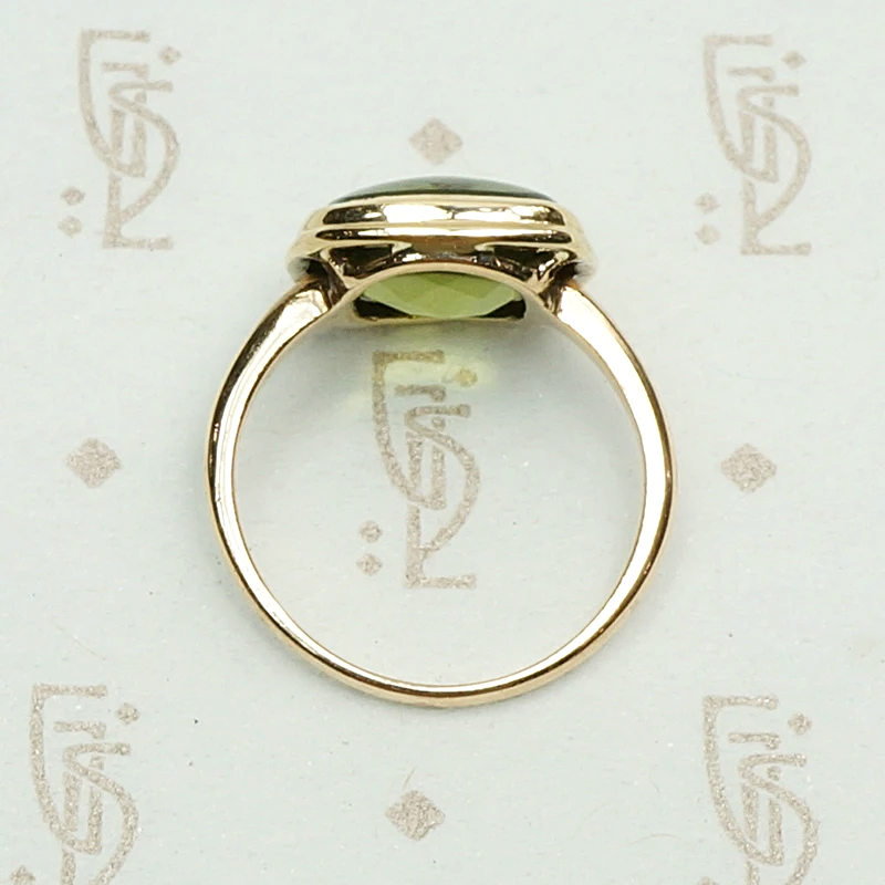 Otsby and Barton Buff Top Peridot Ring