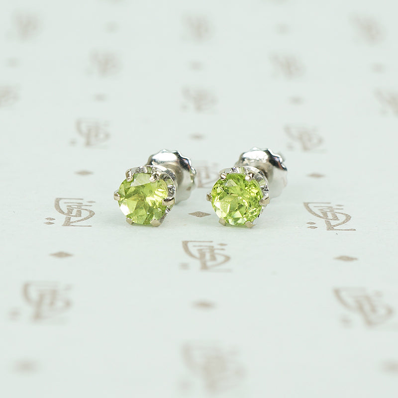 14k white gold peridot stud earrings with screw on backs