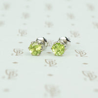 14k white gold peridot stud earrings with screw on backs