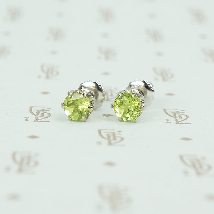 14k white gold peridot stud earrings with screw on backs