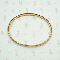 Engraved Gold Vintage Bangle Signed Krementz. Top view.