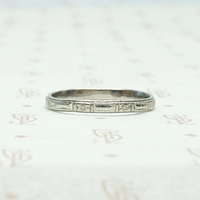 Art Deco Flowers and Bars Platinum Band, profile view.