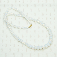 Edwardian Venetian Opaline Bead Necklace. Coiled view.