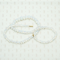 Edwardian Venetian Opaline Bead Necklace. Coiled view.